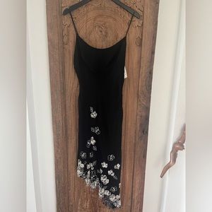 GORGEOUS BCBG Black with white lace flowers and mini pearls